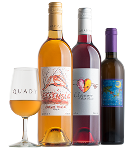 Essensia Orange Muscat, Elysium Black Muscat and Deviation desserts wines next to a small glass of dessert wine.